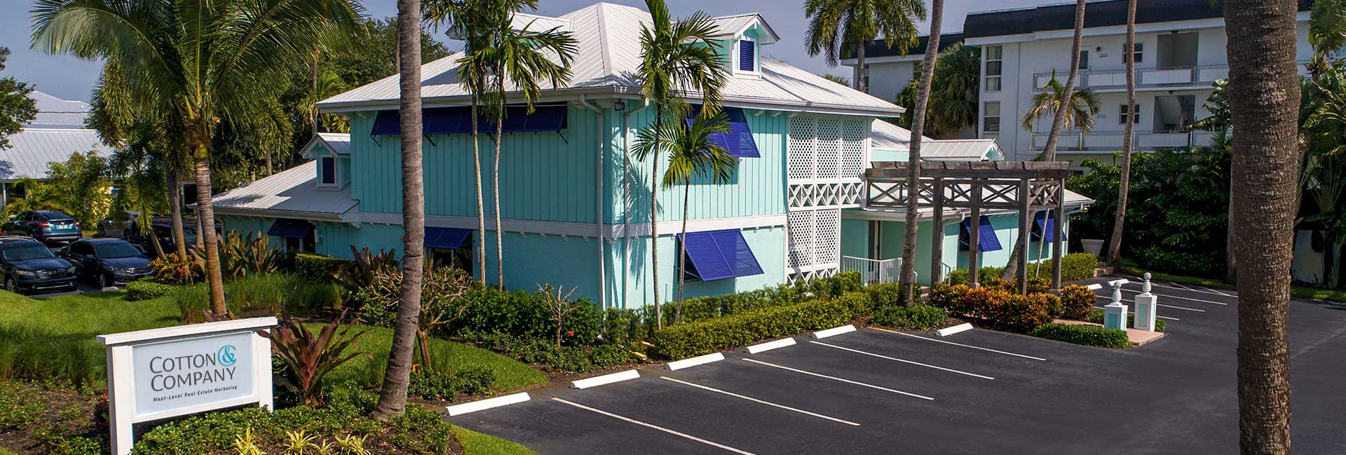 blue building in stuart florida cotton and company head quaters
