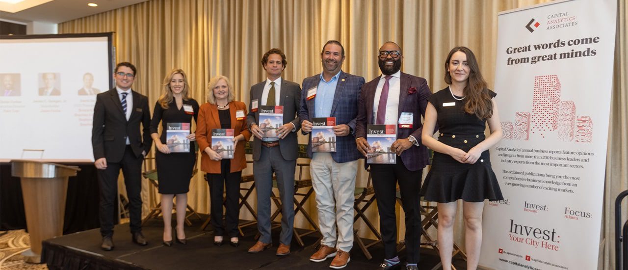 panel of speakers at the palm beach invest conference